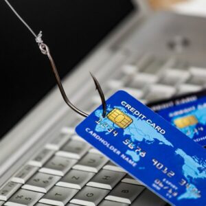 Credit cards on a hook representing cybersecurity breach phising