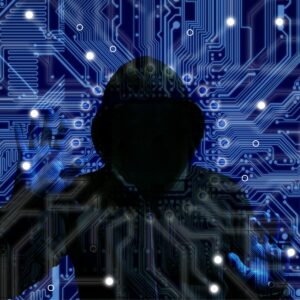 Hooded figure of a hacker